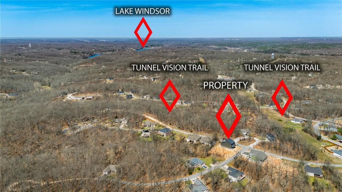 Image 3: Drone / aerial view of a heavily wooded area