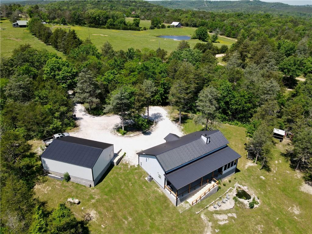 Image 3: Contemporary style residence featuring a dark meta