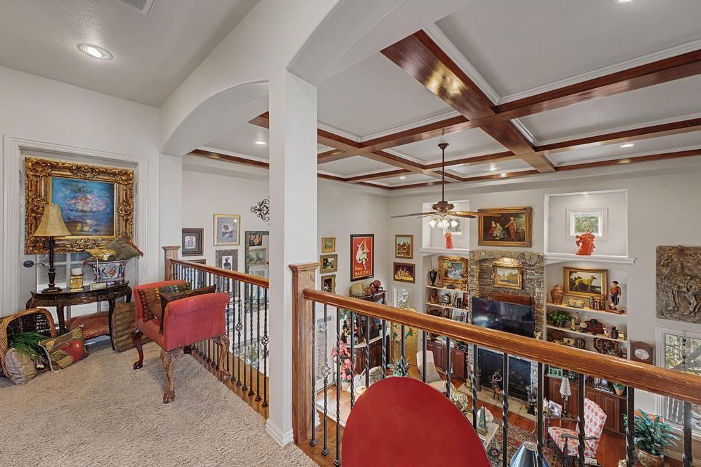 Image 4: Balcony overlooking the living room.