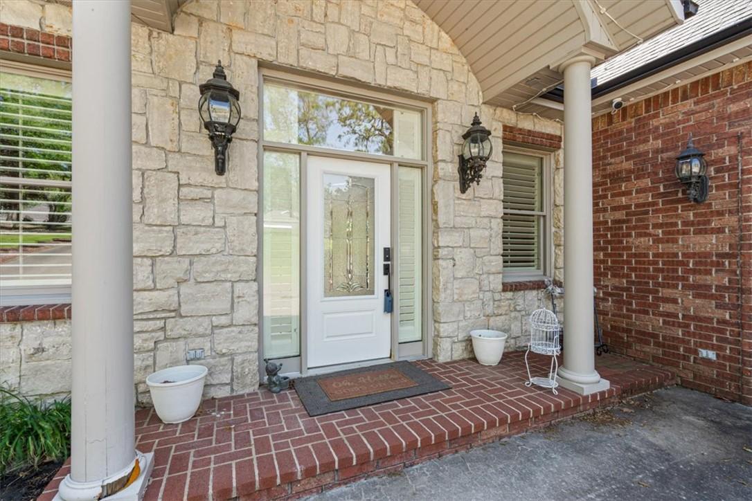 Image 2: The front entry is very inviting.
