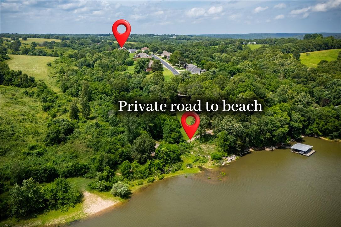 Image 2: Expansive acreage featuring abundant mature trees,
