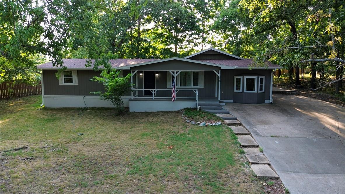 Image 2: Single-story residence with a covered front porch