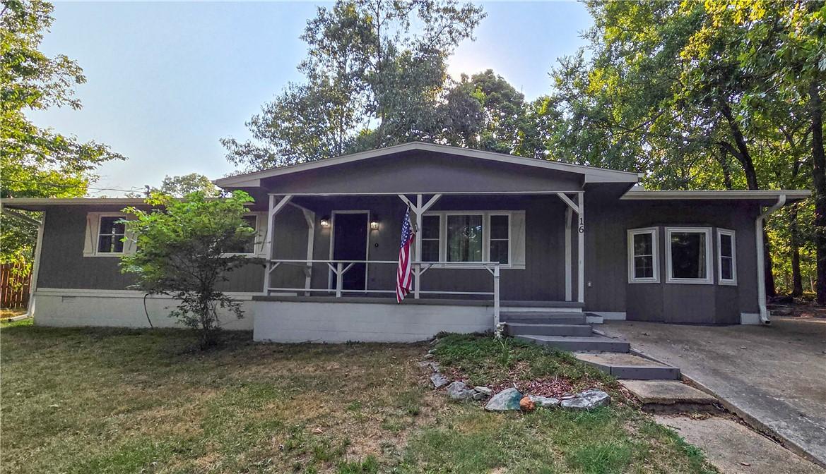 Image 3: Charming ranch-style home featuring a covered fron