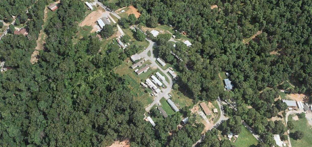 Image 1: Aerial view of property and surrounding area featu