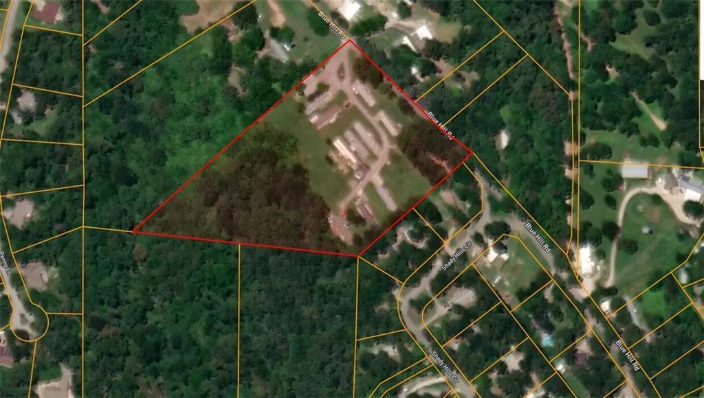 Image 3: Aerial overview of property's location featuring p