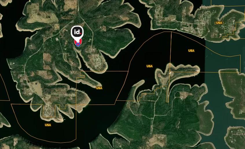 Image 2: Far aerial view showing where property adjoins Cor