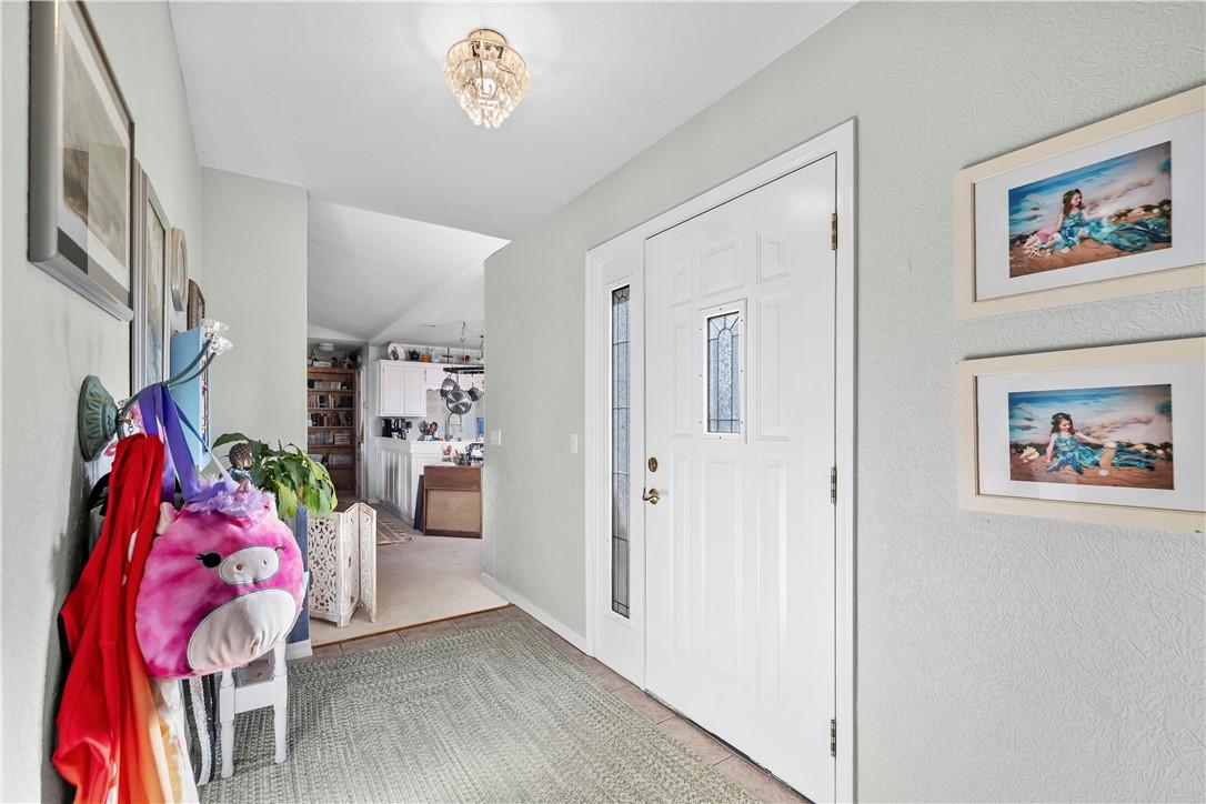 Image 2: Entryway featuring a textured wall