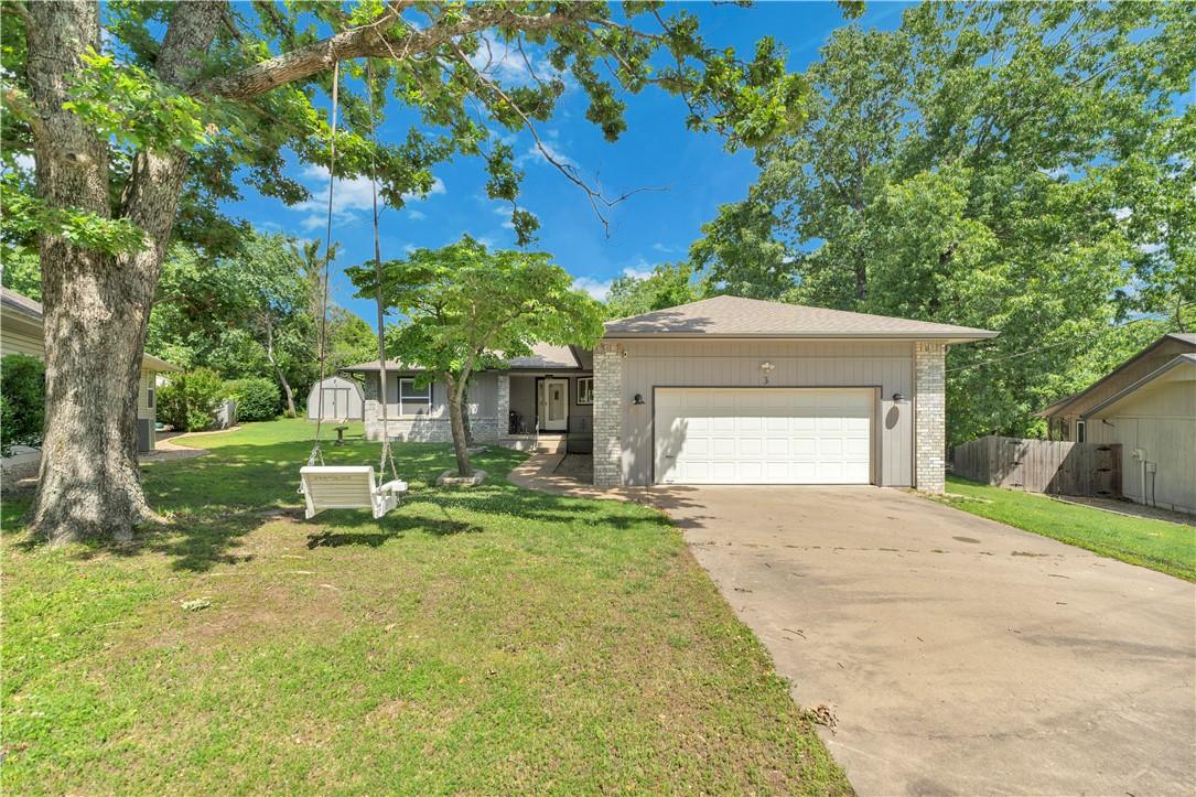 Image 1: Single-story residence featuring a two-car garage,
