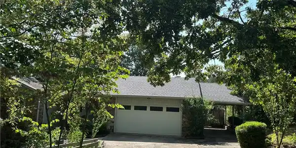 Image 4: Single-story residence featuring a two-car garage