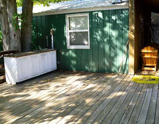 Image 2: Patio/Deck. New deck, overlooks the lake. Has stai