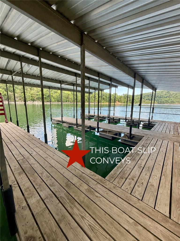 Image 2: Boat Slip in co-owned boat dock. 2nd from end on r