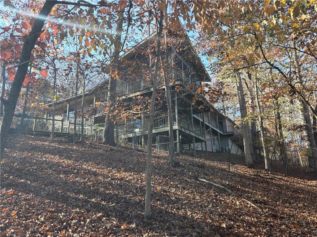 Image 2: Rear view of house, showing 3 levels of wrap aroun