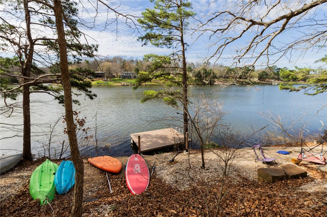 Image 1: Water view featuring a floating dock