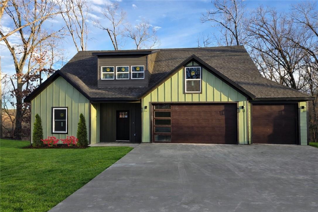 Image 2: Artificially staged grass and landscaping.