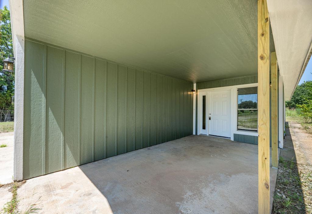Image 3: Large porch leading to front entry