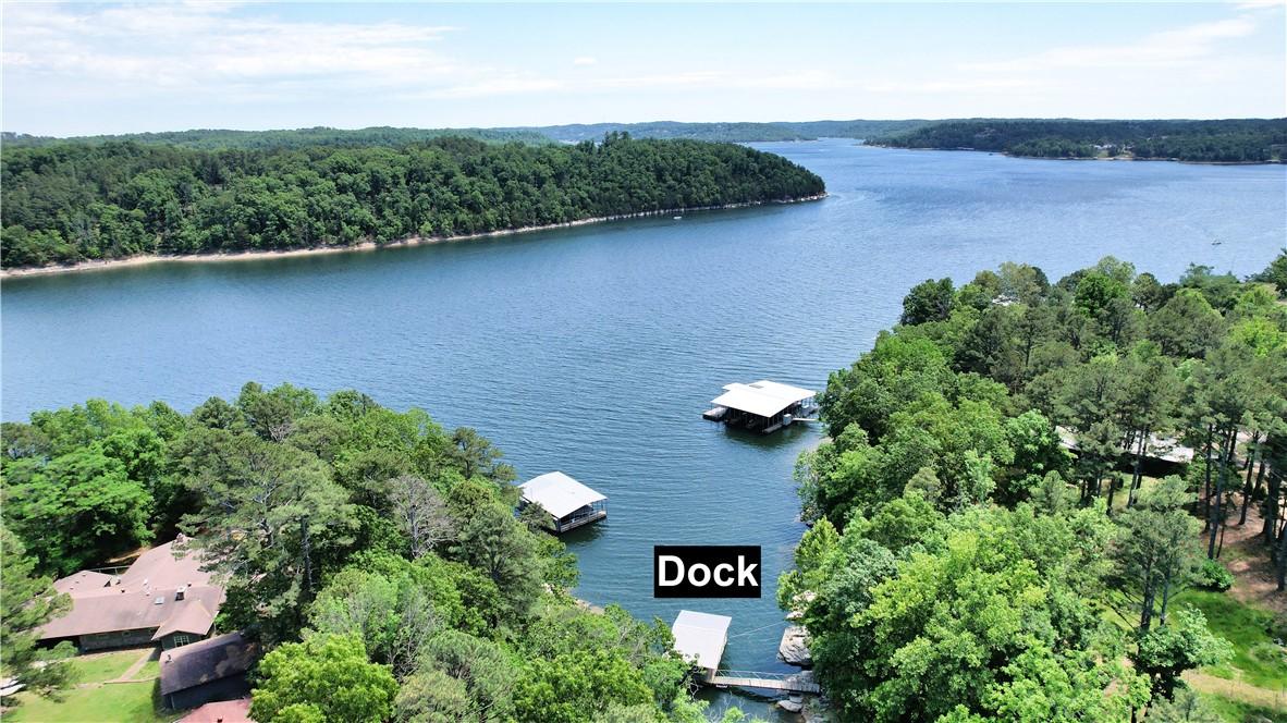 Image 3: Expansive waterfront property featuring a private