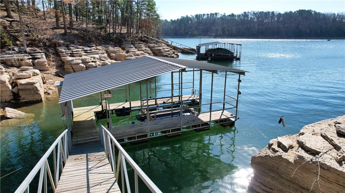 Image 4: Private dock - one slip with lift.