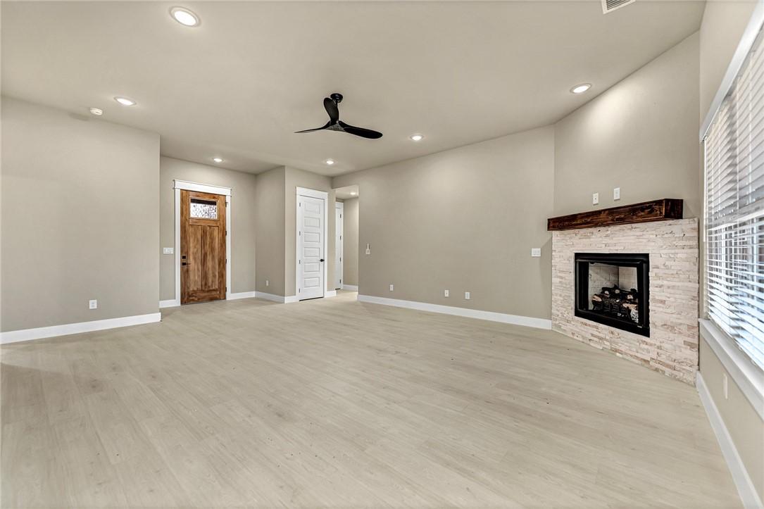 Image 4: Unfurnished living room featuring light wood-type