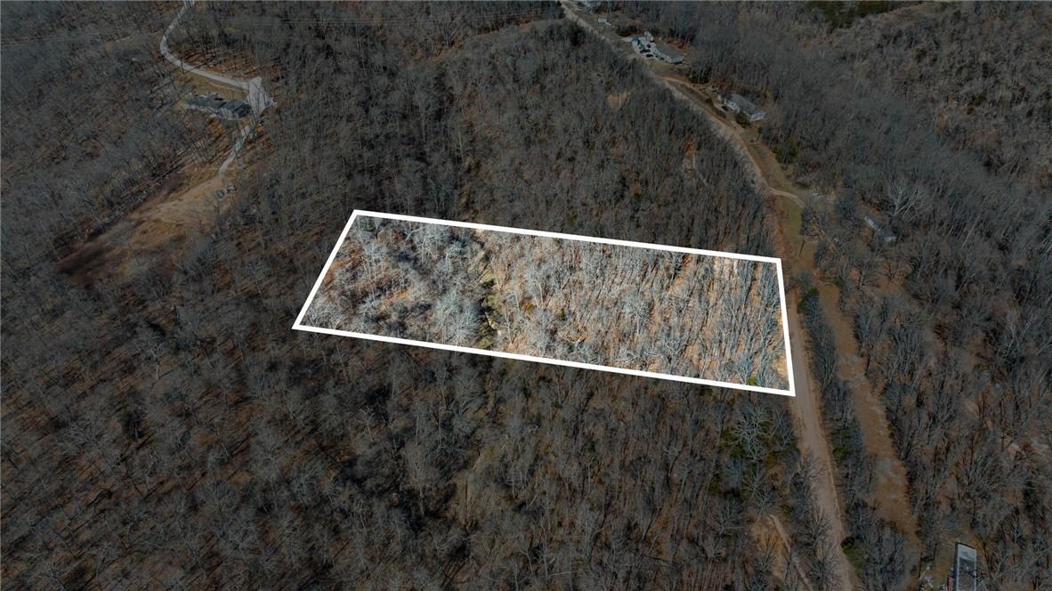 Image 3: Aerial view of property's location featuring a for