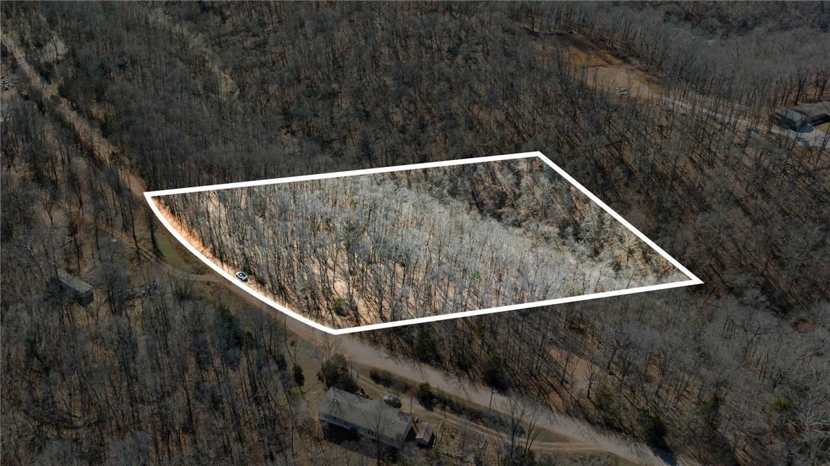 Image 2: Aerial view of property and surrounding area featu