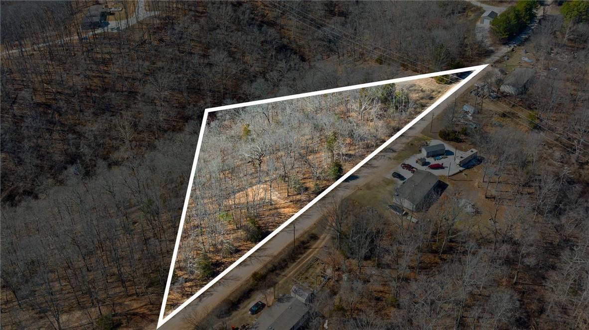 Image 2: Aerial overview of property's location featuring p