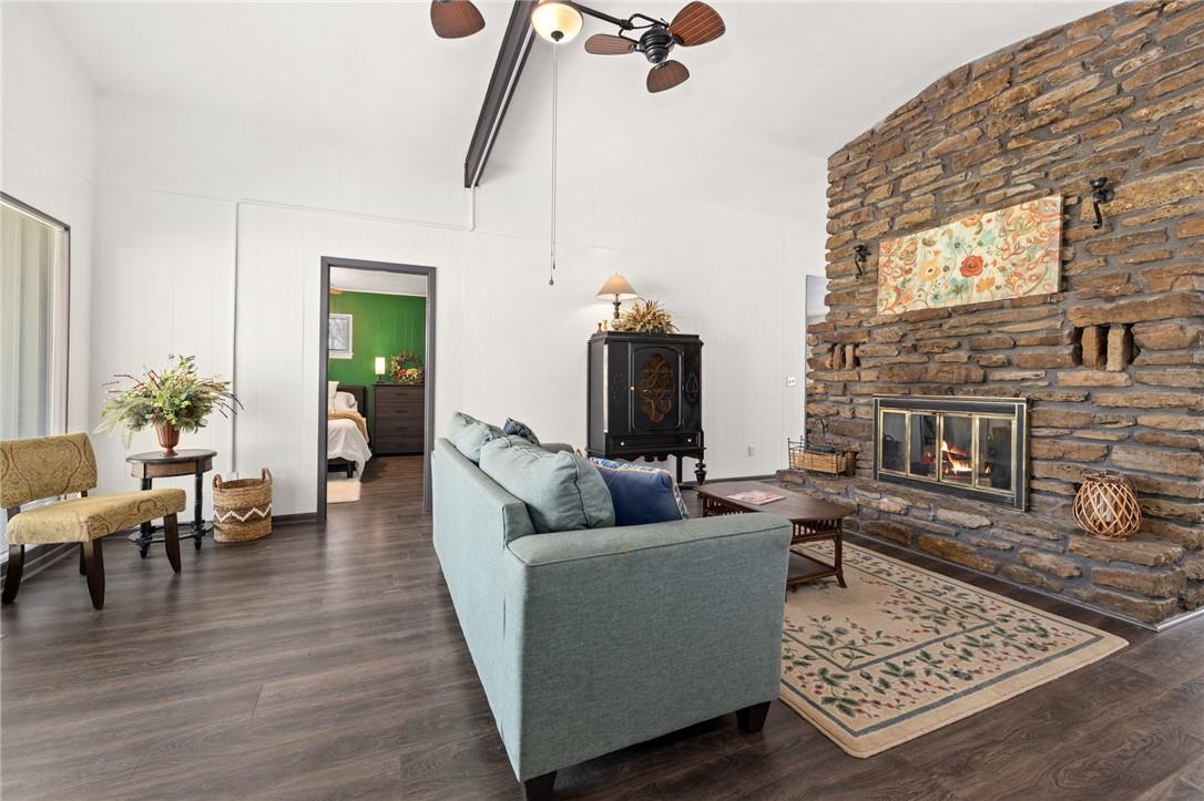 Image 4: Living room with dark wood finished floors, a ceil