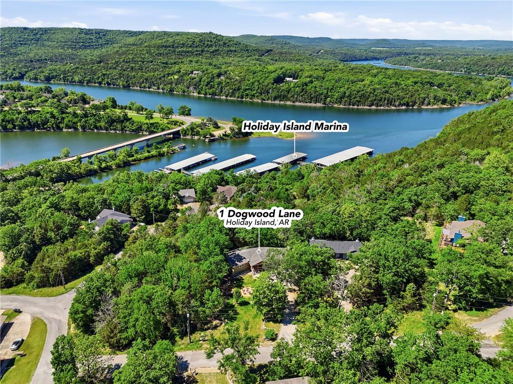 Image 2: Aerial perspective showcasing a residential proper