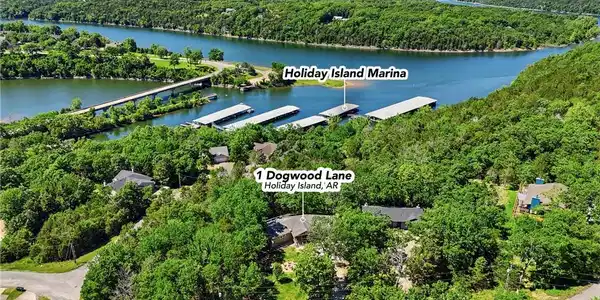 Image 2: Aerial perspective showcasing a residential proper
