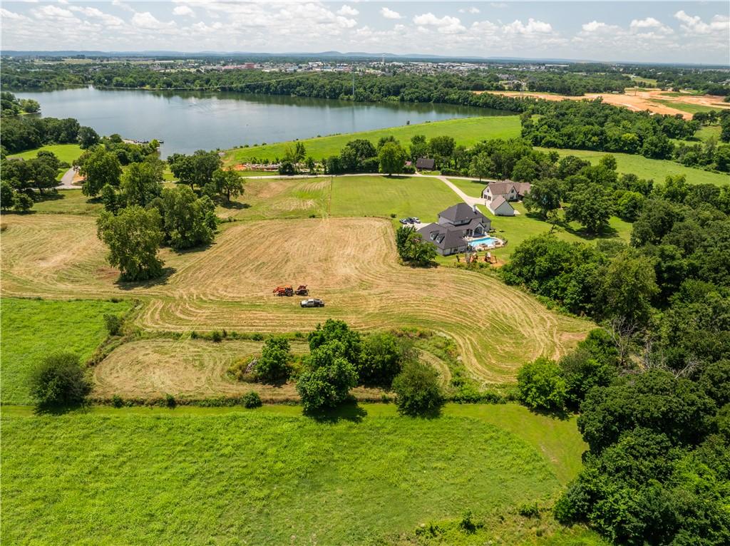 Image 1: Expansive rural property featuring a large lake, c