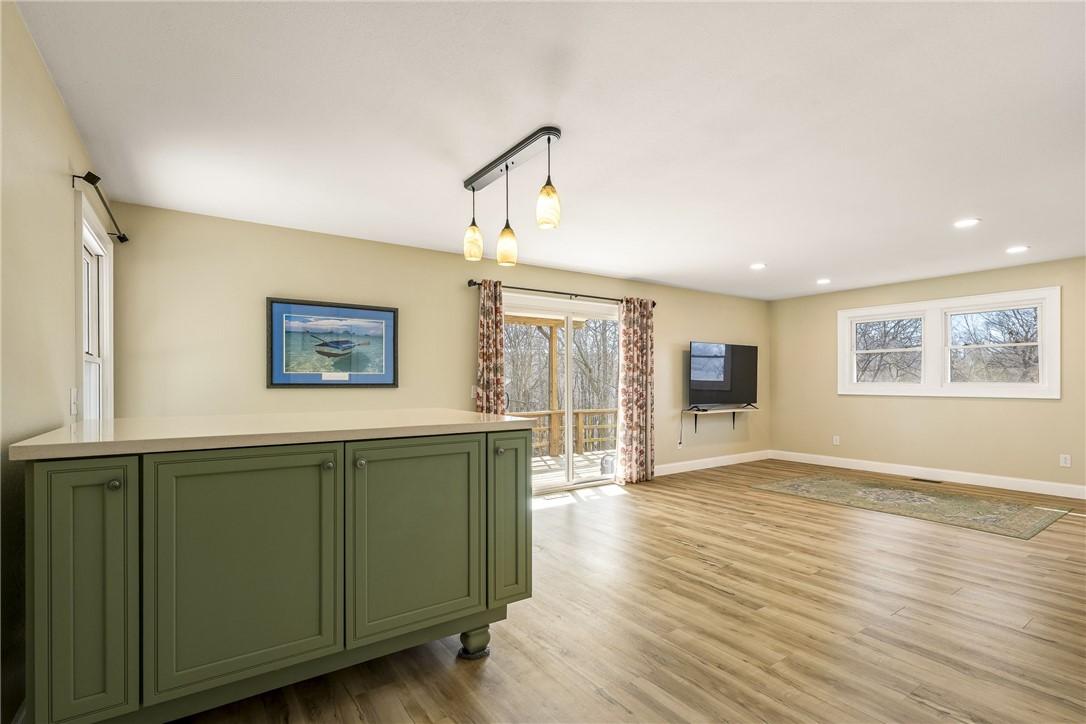 Image 3: Dining area featuring light wood-style flooring an