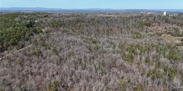 Image 4: Drone / aerial view of a mountain backdrop