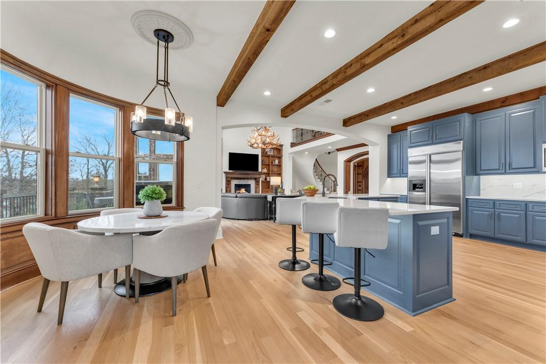 Image 3: Eat in Kitchen with beam ceiling, new all wood flo