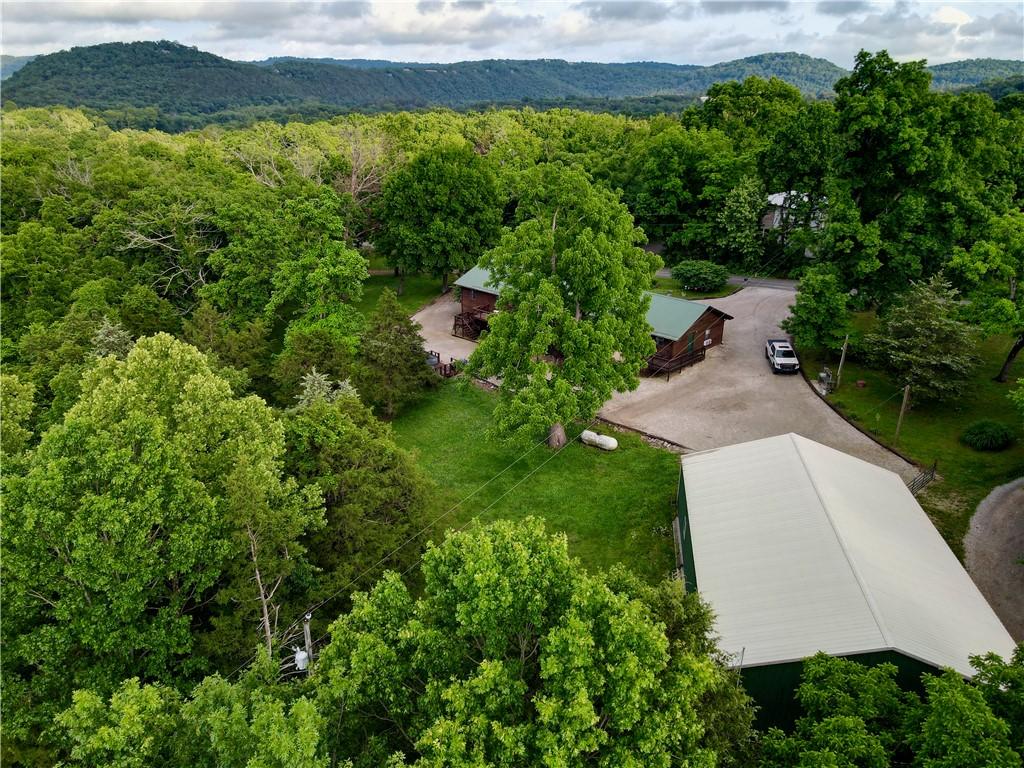Image 3: Expansive property with multiple buildings nestled