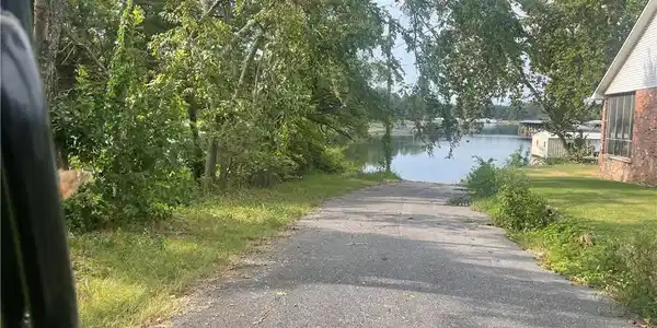 Image 3: Southwest corner of the property facing lake and p