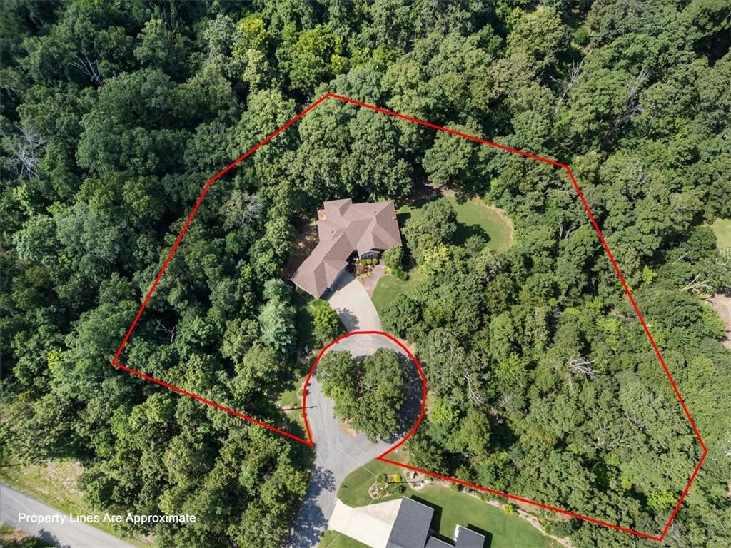 Image 2: This shows home with two additional lots. Listed w