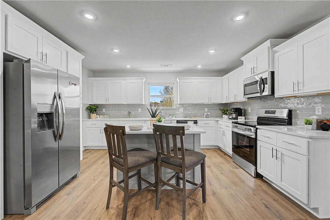 Image 1: Beautiful kitchen with lots of storage and added i
