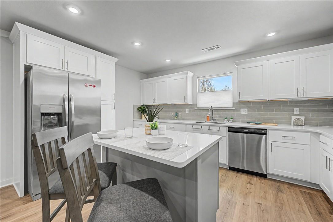 Image 4: Kitchen featuring top down bottom up blinds.