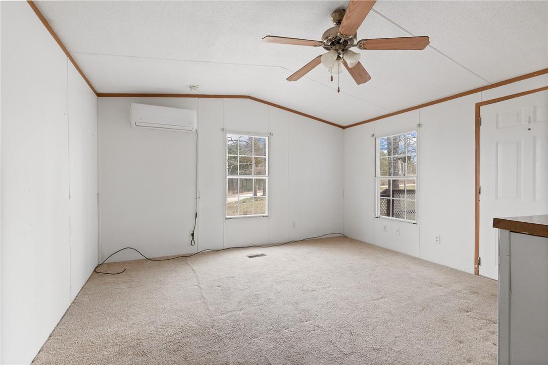 Image 4: Empty room featuring light colored carpet, ornamen