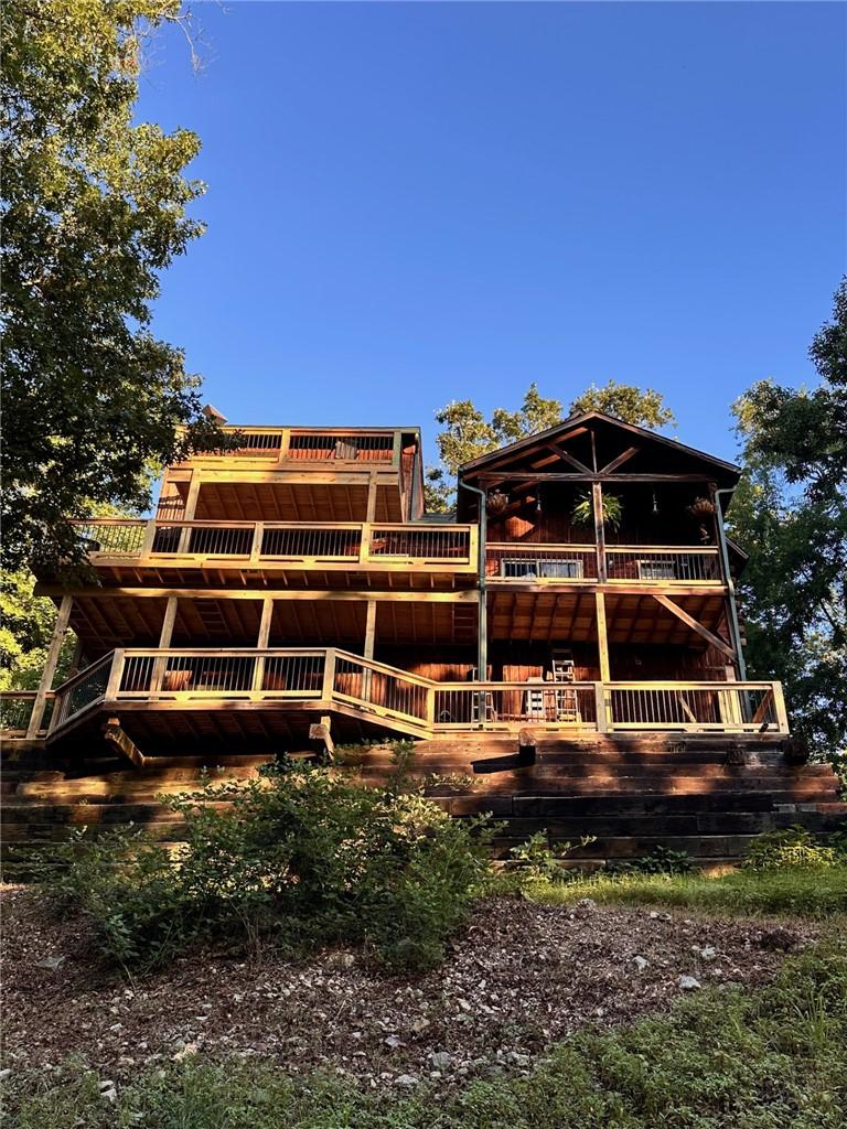 Image 3: The property features a multi-level structure with