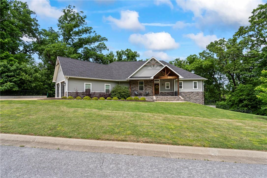 Image 3: Craftsman-style home featuring a covered front por