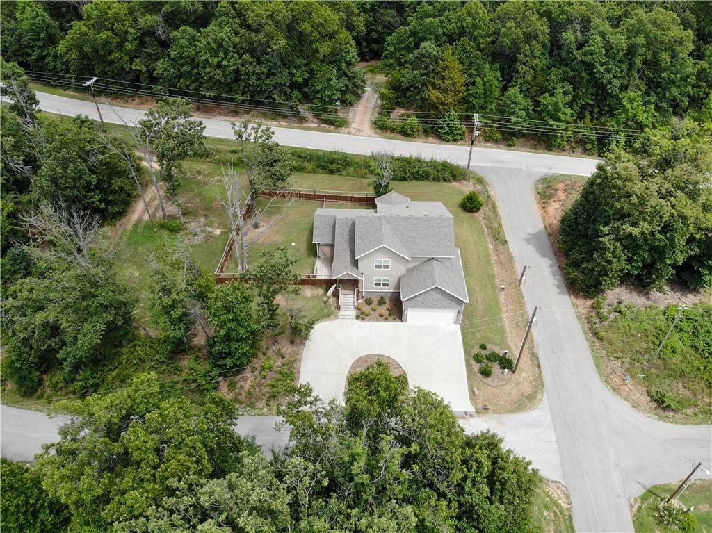 Image 3: Aerial perspective showcasing the property's setti