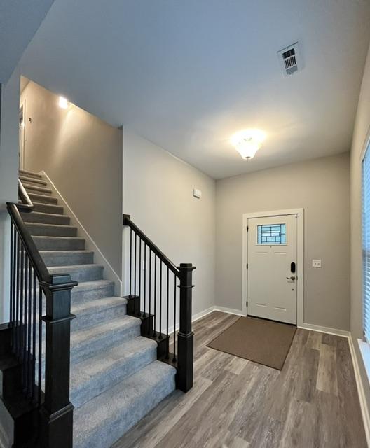 Image 4: Inviting entry foyer featuring wood-finish floorin