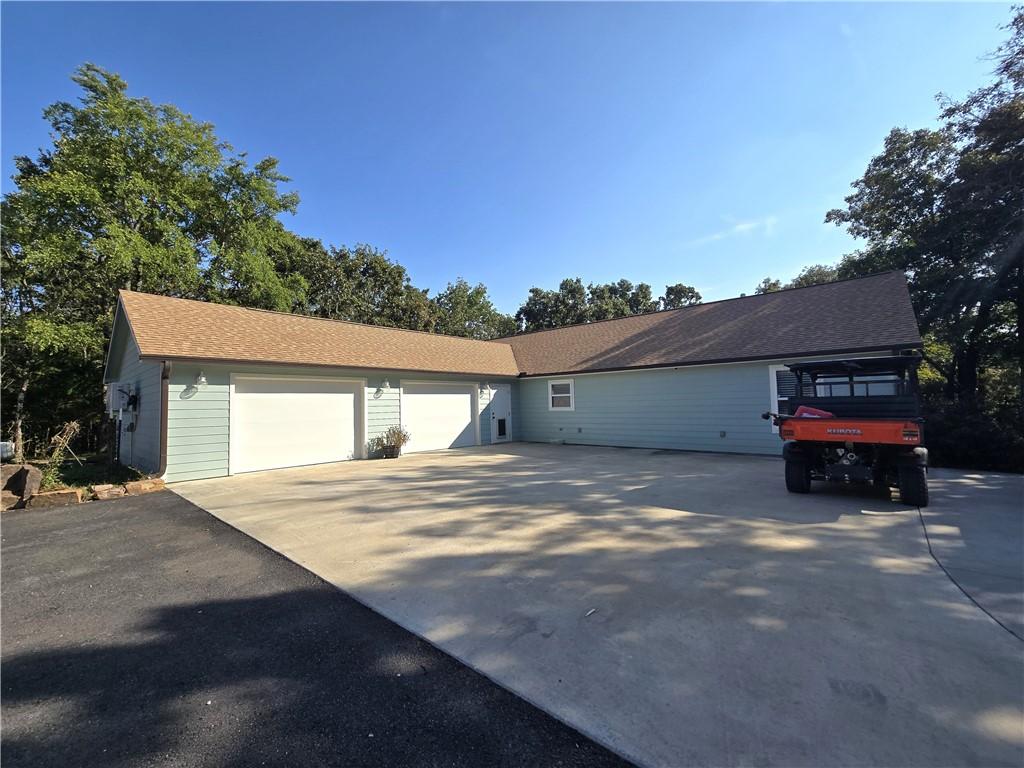 Image 4: Heated & cooled attached Garage & Entrance From Dr