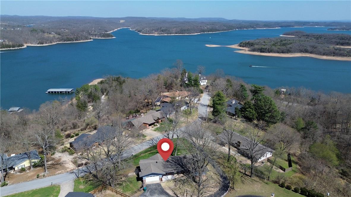 Image 3: Aerial view of property and Beaver Lake