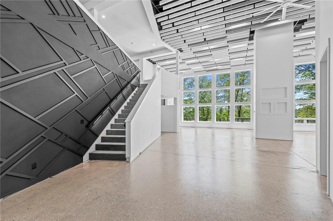 Image 4: Foyer entrance to great room with deck and lake ac