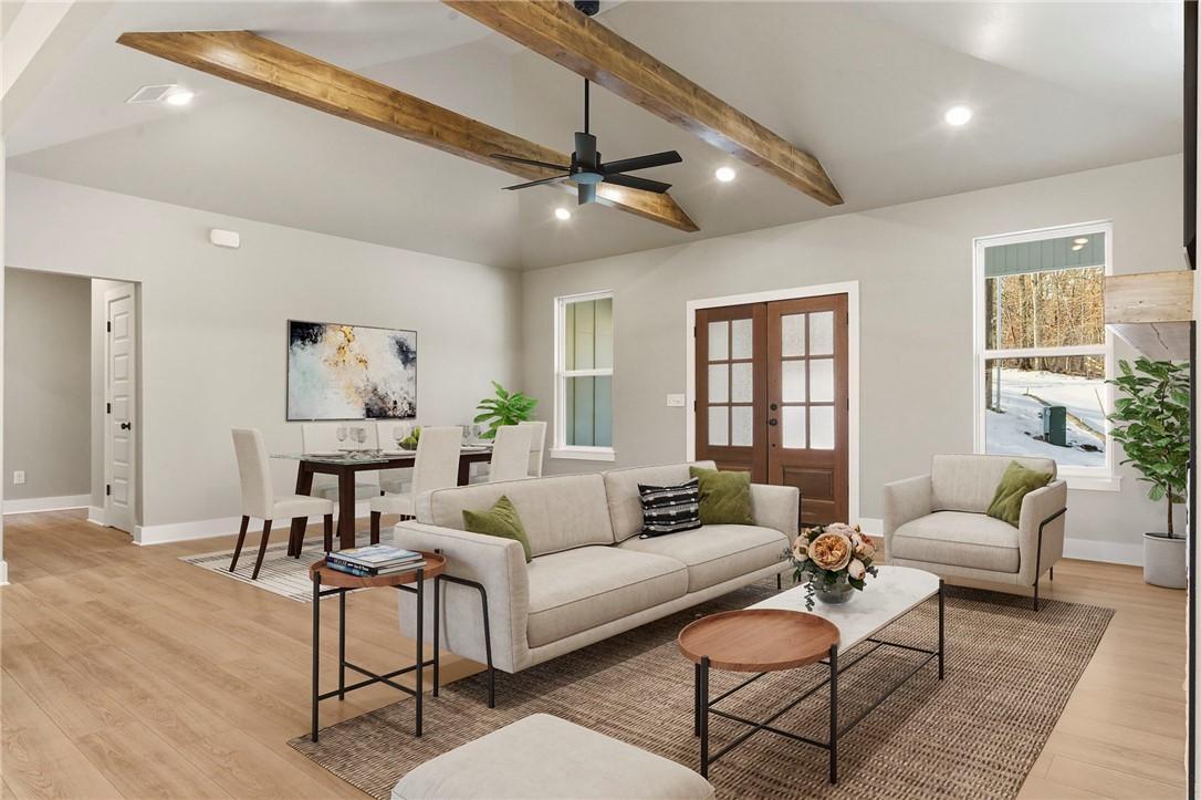 Image 2: Living room featuring light wood finished floors,