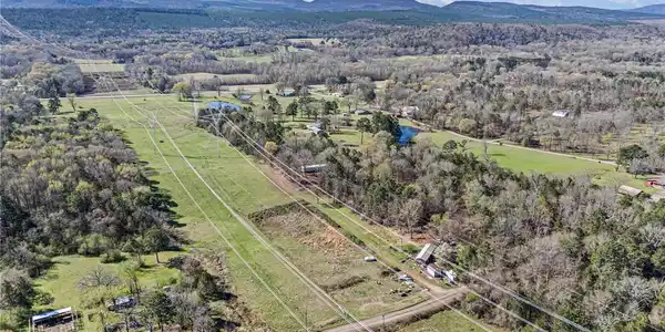Image 3: Expansive rural landscape featuring a mix of clear