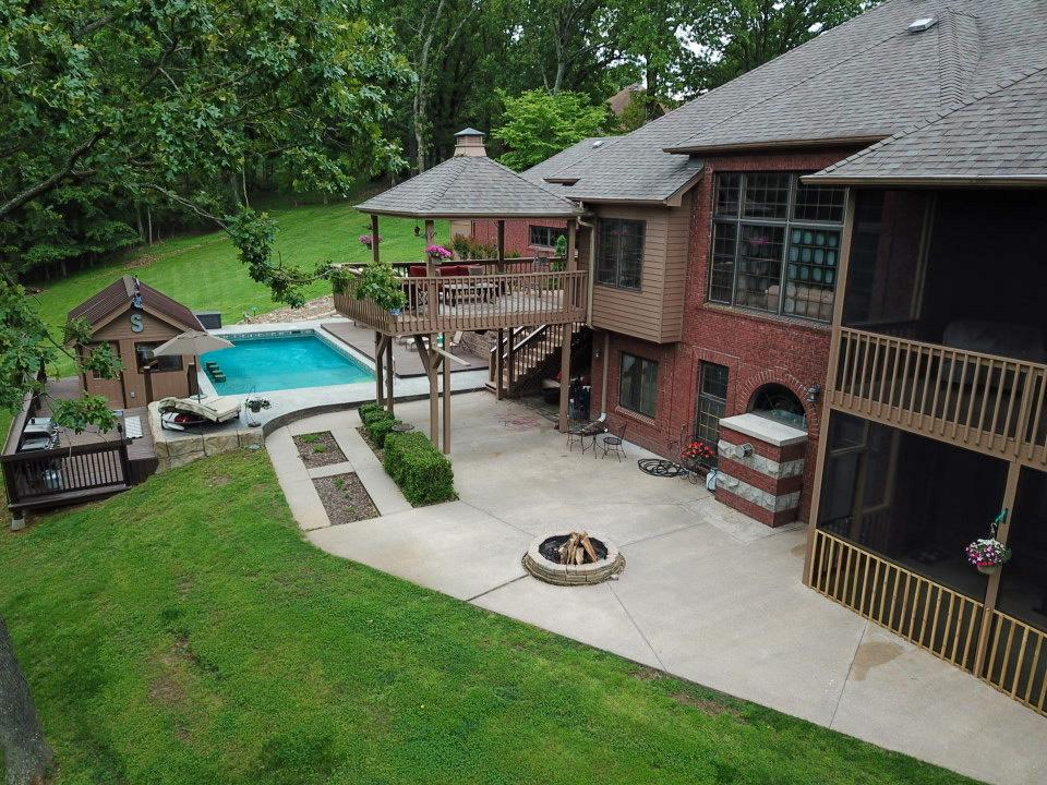 Image 3: View of backyard from last year when the property