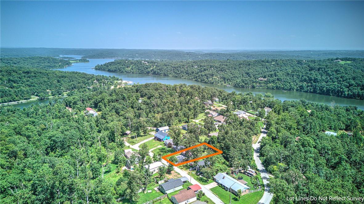 Image 2: Aerial perspective showcasing a residential proper