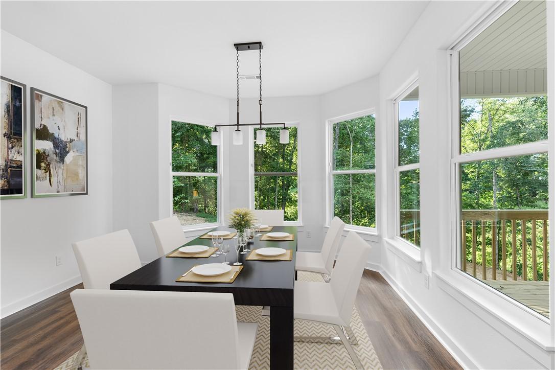 Image 2: Eat in kitchen with virtual staging